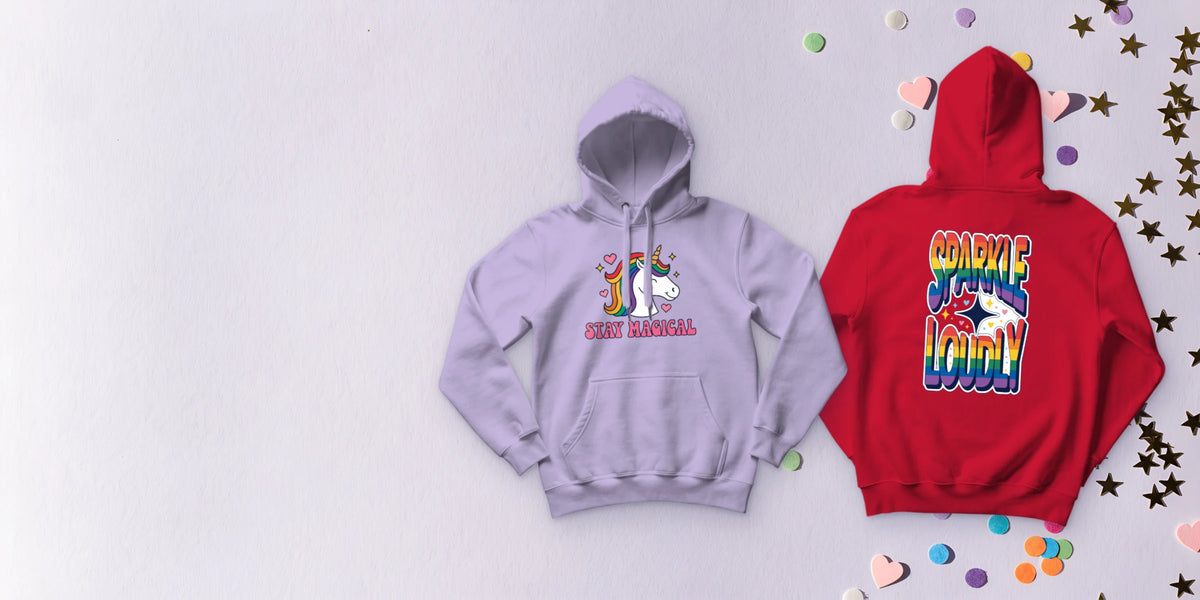 Custom printed hoodies laid flat: a rainbow unicorn pullover and a Sparkle Loudly zip hoodie