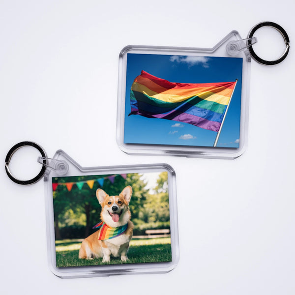 Custom photo keyrings showing a corgi in a rainbow bandana on the front and a rainbow flag on the back
