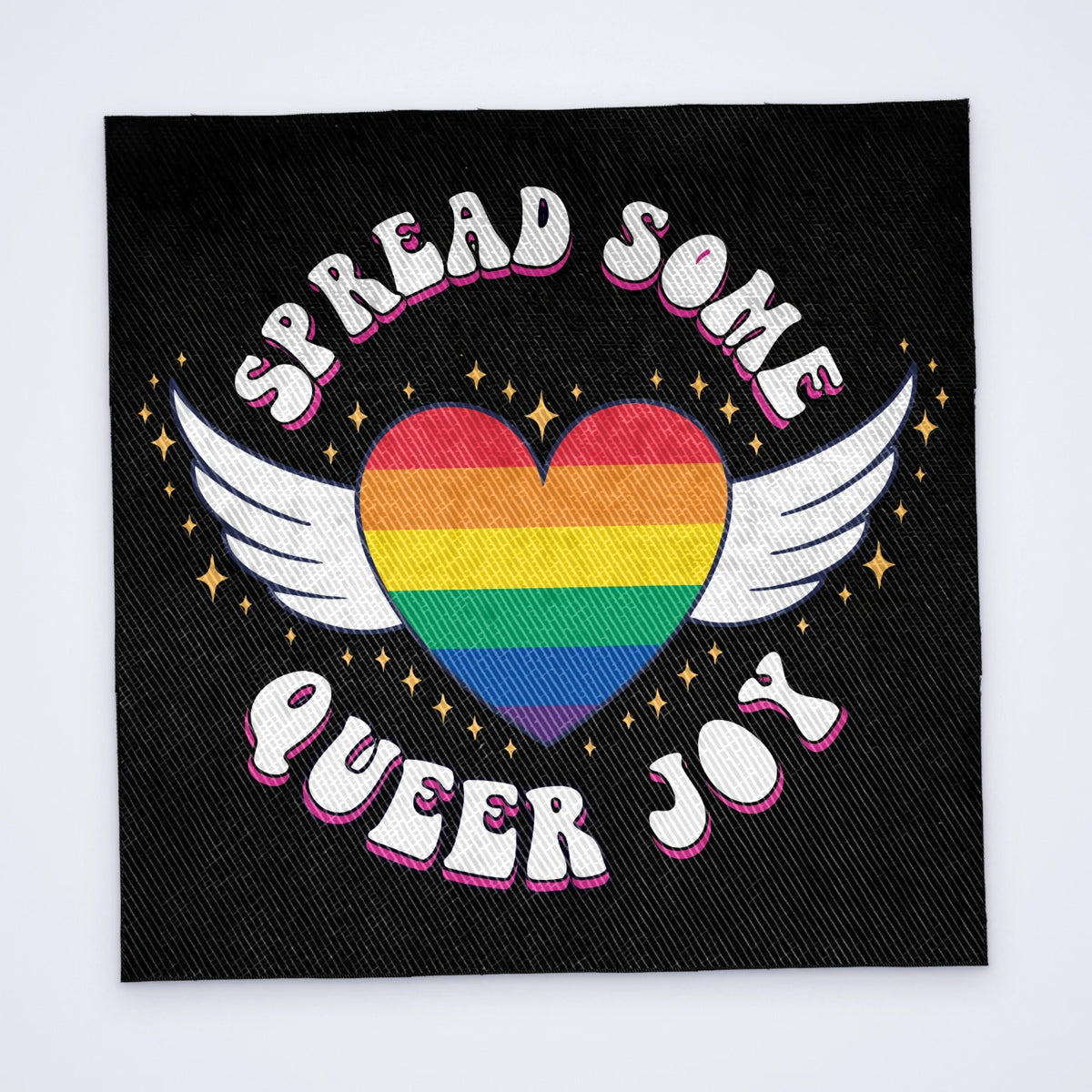 Custom sew-on back patch printed in full colour with a winged rainbow heart and the words Spread Some Queer Joy