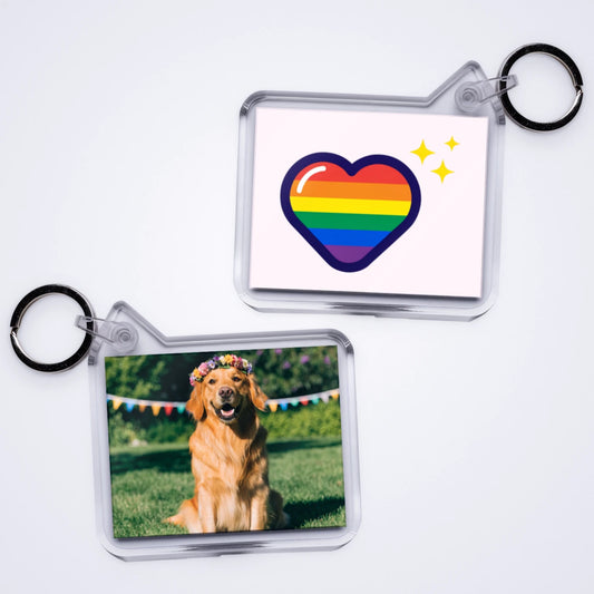 One custom photo keyring with a photo of a golden retriever in a rainbow flower crown, and a rainbow heart on the back